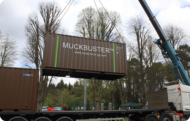 The Muckbuster®, a containerised Anaerobic Digestion unit, being loaded on the back of a lorry.