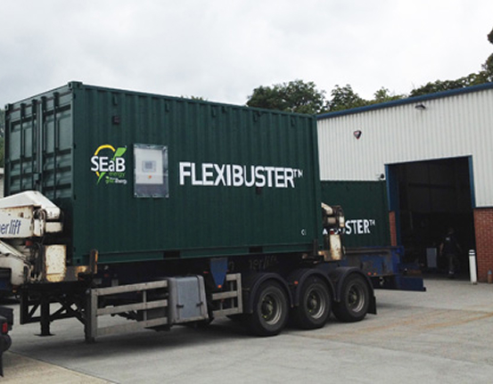 The Flexibuster™, a containerised Anaerobic Digestion unit, being delivered to a site, representing the product of SEaB Energy's products.